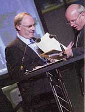 Greg Dyke presents the award for Outstanding Contribution